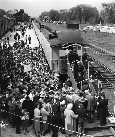 Crowds of people at Aurora Station lining up to take a tour through the coaches of the
Museum Train