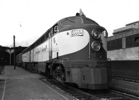 Fairbanks-Morse diesel locomotive 4802 on a trial run at Toronto Union Station.  These locomotives have a 3 axle trailing truck