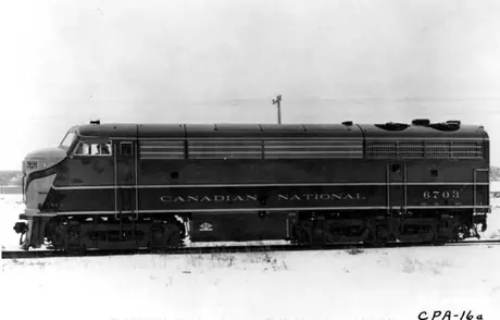 Diesel locomotive CPA-16a 6703 built by Canadian Locomotive Company in 1954-5.  The 3-axle rear truck was needed to carry a steam generator for heating