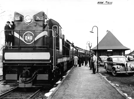 Diesel locomotive CRG-12b 7615 with a passenger train at Chambly, Quebec