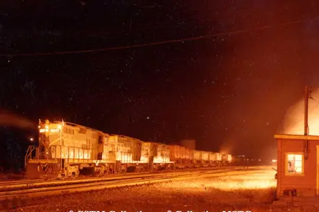 A piggyback train (trailers on flatcars) leaving Turcot Yard at night