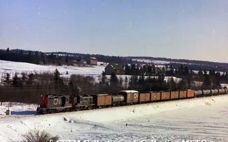 Moncton-Sackville freight train in New Brunswick.  Locomotives are GP-9 4476 and RS-3 3040