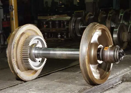 Diesel locomotive wheel set with gear