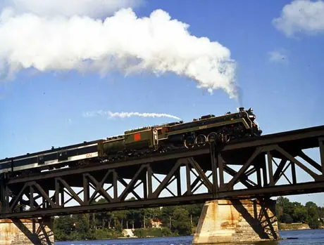 Restored steam locomotive U-1-f 6060 by Montreal Locomotive Works in 1944, on Beloeil Bridge