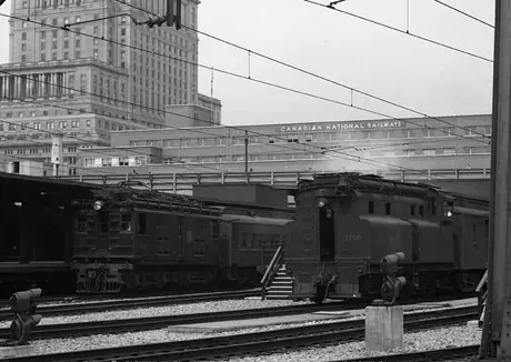 Diesel locomotives 7700, built in 1929 by Canadian Locomotive Company and retired in 1962; and electric locomotive z-1-a 9103 built by General Electric ca.1915 and retired in 1995