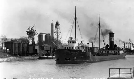 Ship passing through the Welland Canal at Port Colborne, Ontario