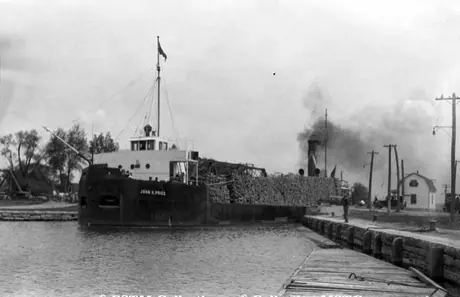 Freighting wood through Lachine Canal, Montreal