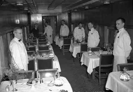 Dining car staff getting ready to serve Sir Winston Churchill