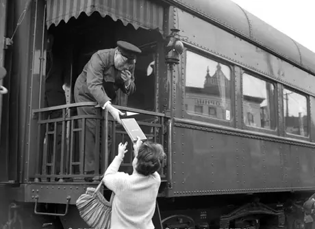 British Prime Minister Sir Winston Churchill giving an autograph