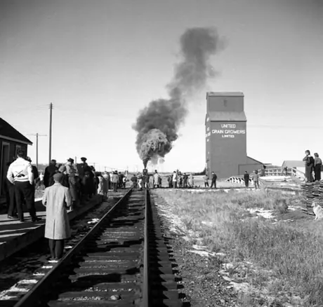 People gathered to see Canadian National Railways steam locomotive 5114 on its last run