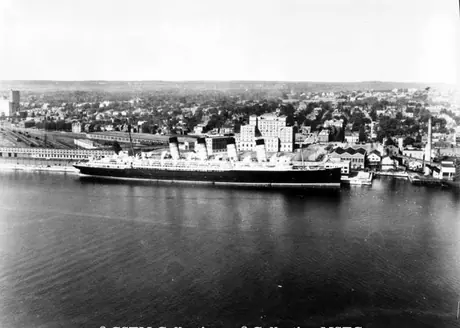 Troop and war bride carrier S.S. Mauretania docked at Pier 21