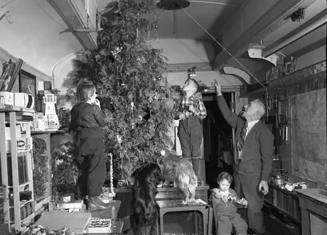 Teacher Fred Sloman and his students before thier Christmas party aboard the railway school car