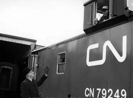 President MacMillan inspecting new caboose CN79249